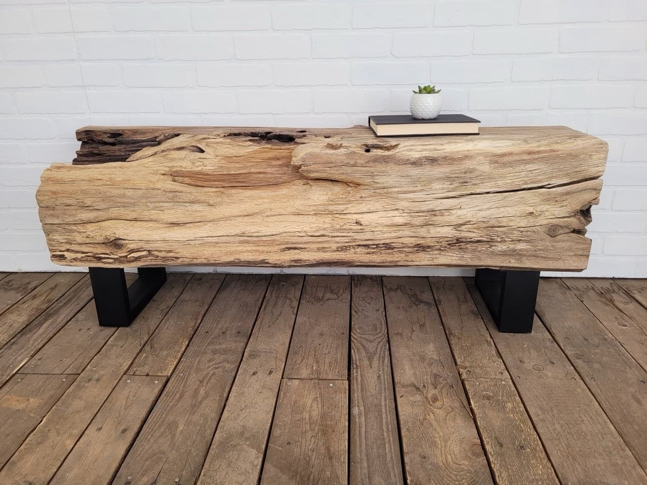 Reclaimed wood bench showing natural grain and expert joinery